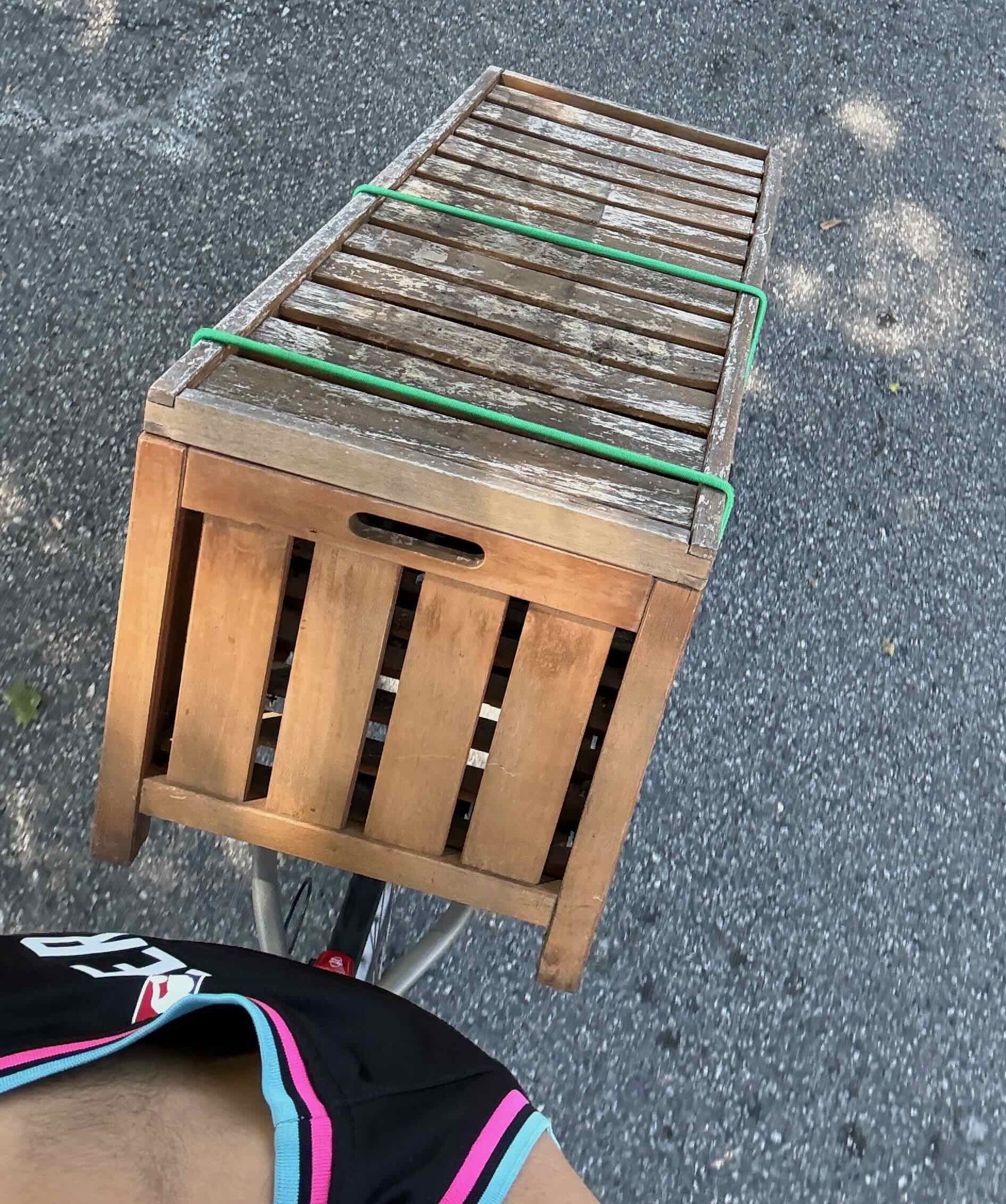 Riding the bike with the bench strapped to the Travoy
