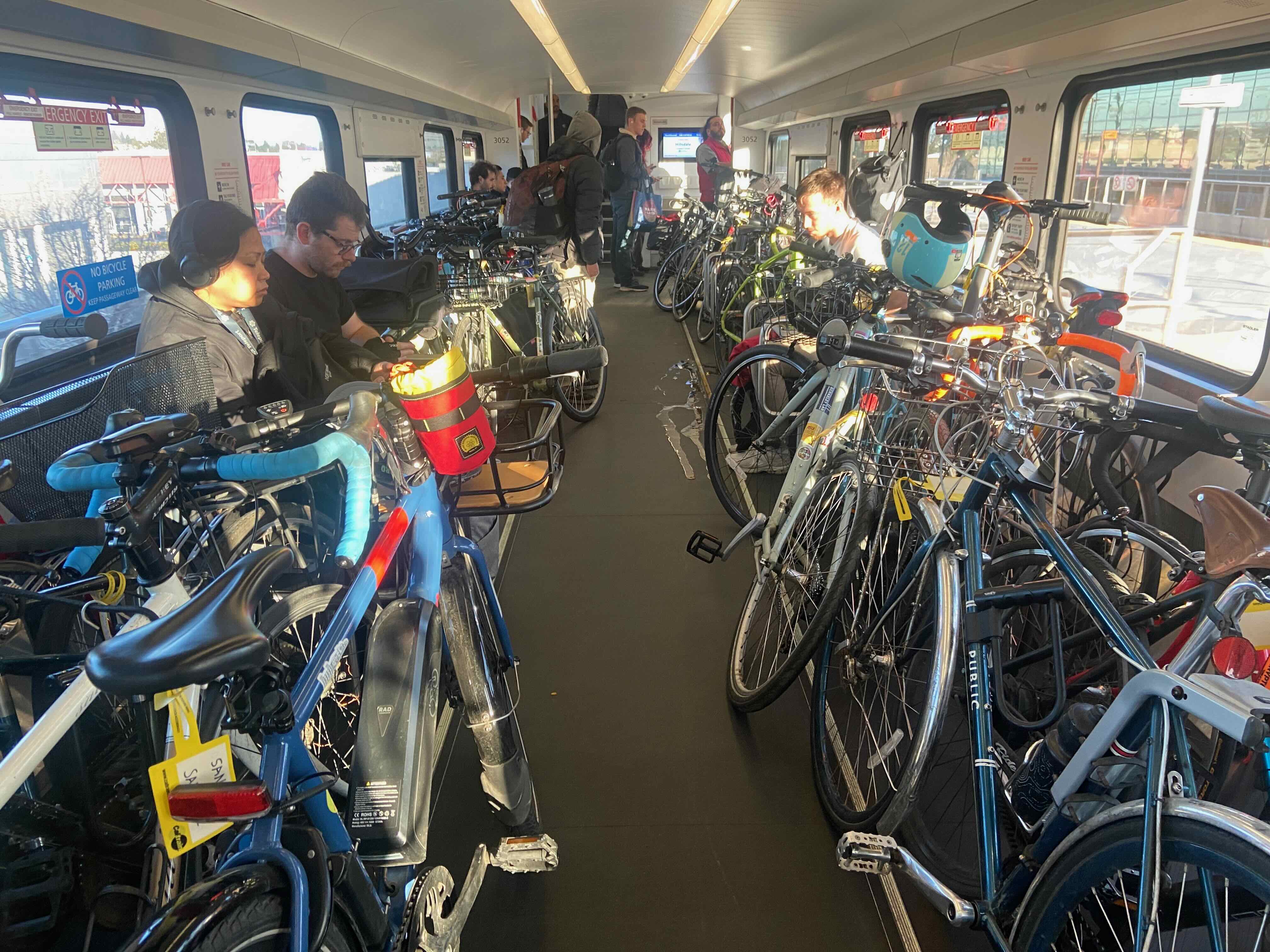 Bikes racked in the Caltrain bike car on a weekday morning