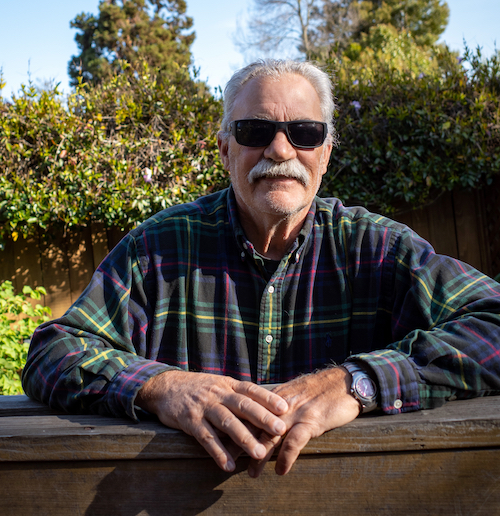 My neighbor Mike, leaning forward with sunglasses