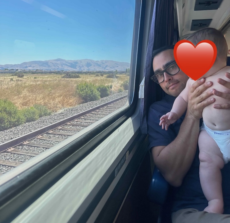 father and son on the Amtrak train