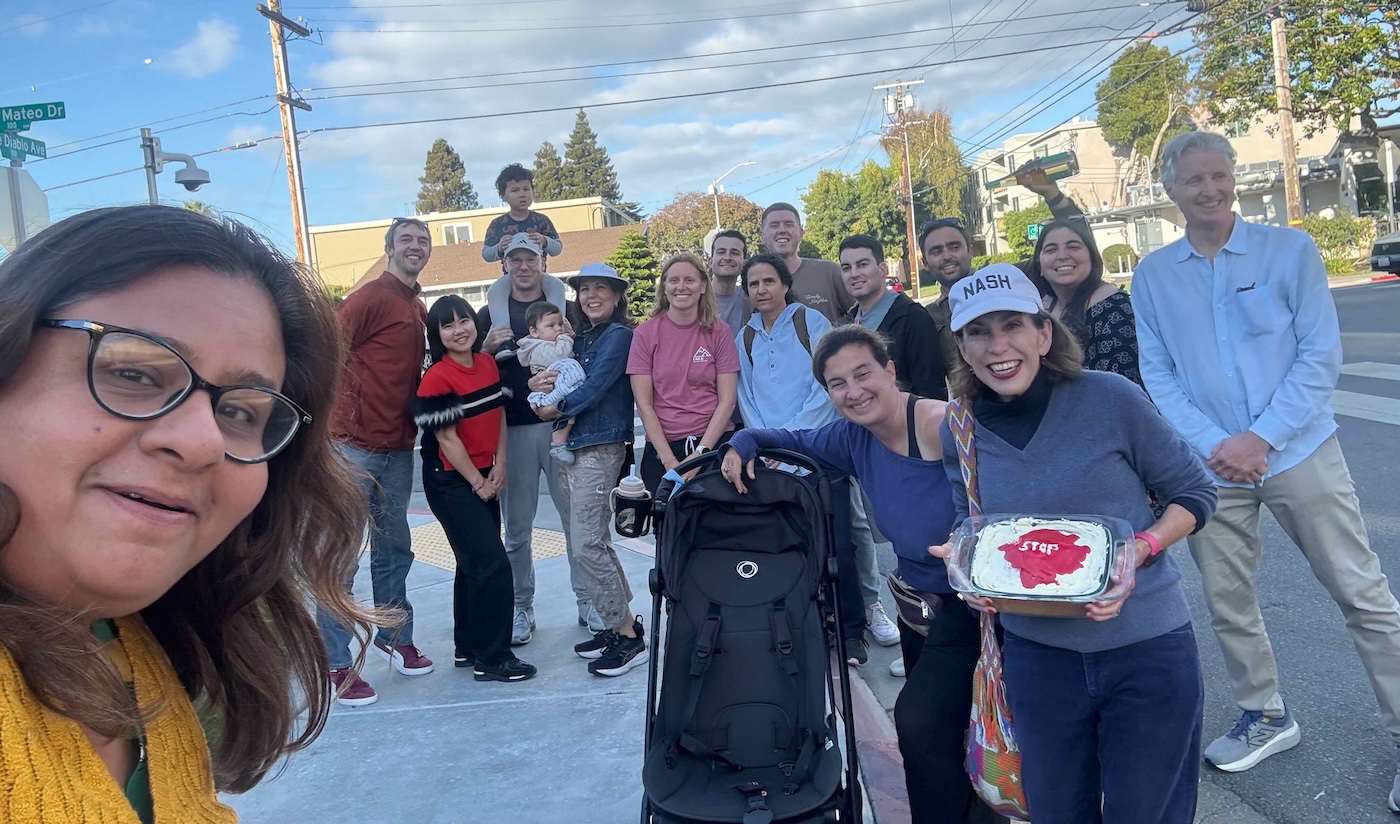 Neighbors gathered on the corner after the all-way stop went in