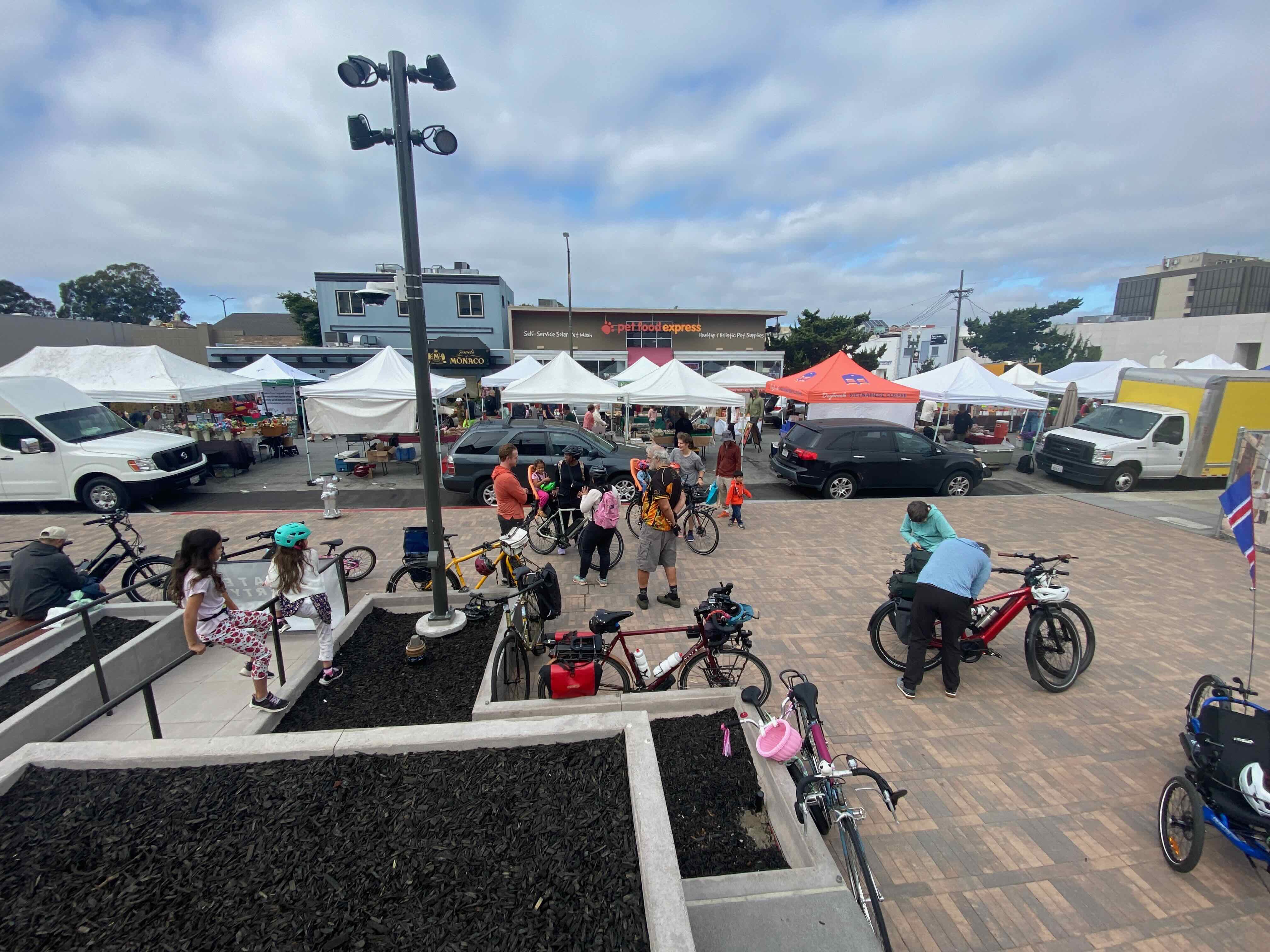 A group of cyclists arriving at the Burlingame farmers market